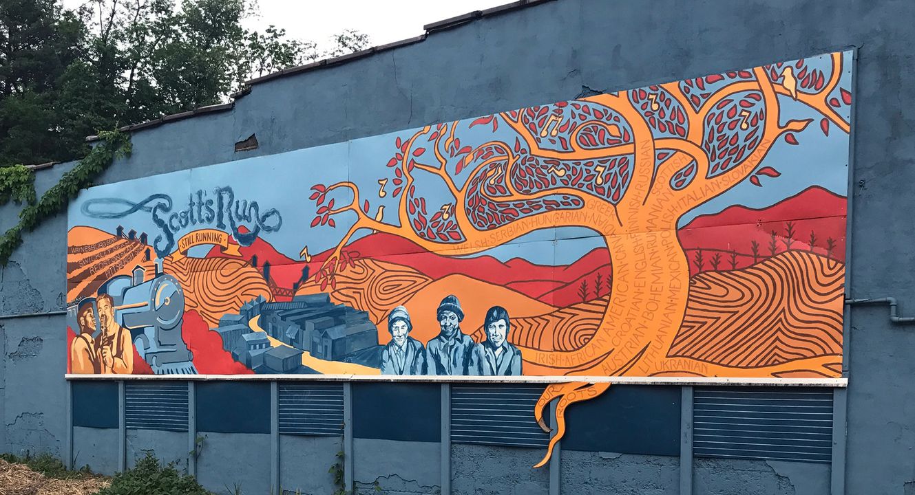 wall mural of a tree and local people