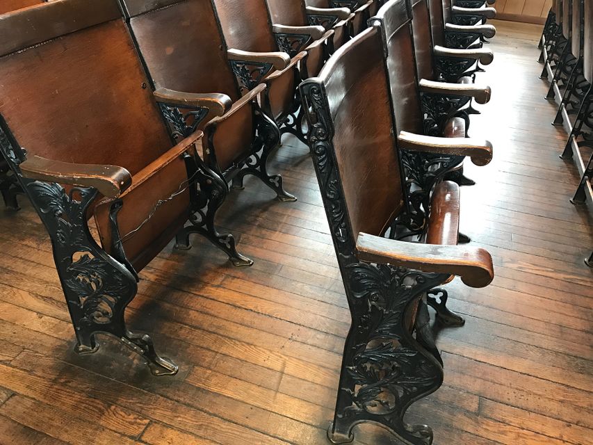 old fashioned chairs inside courthouse